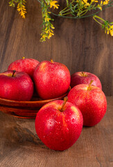 Red apple fruit isolated on wooden background