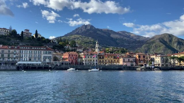 View from boat of picturesque and beautiful village of Varenna Italian village in Lago di Como