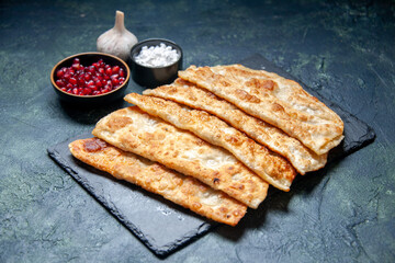 front view tasty gutabs thin delicious hotcakes with meat on dark background pastry bake pie cake color dough oven meal