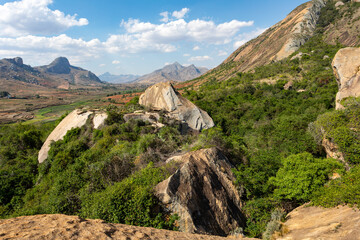 Stunning mountain landscape in the Anja Community Reserve, Madagascar, with vibrant flora and fauna. Nature, travel, adventure, outdoors, hiking, biodiversity. Madagascar wilderness mountain landscape