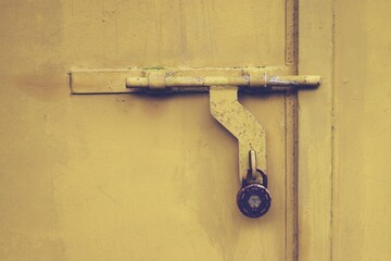 Old  gate locked with padlock