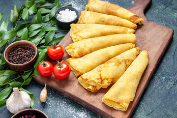 front view tasty pancakes rolled on dark background pastry hotcake dough pie meat color sweet cake meal