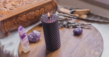 Magical attribute on a table, witchcraft concept, Candle fire, Spells and other rite

