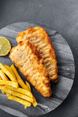 fish and chips french fries deep fried fast food  meal food snack on the table copy space food background rustic top view
