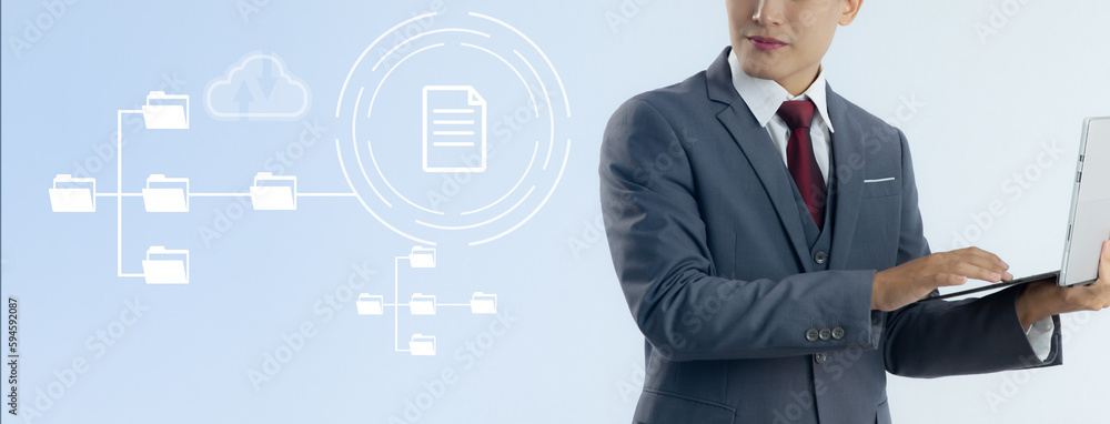 Poster business and technology. businessman using computer laptop to manage data with white folder and file