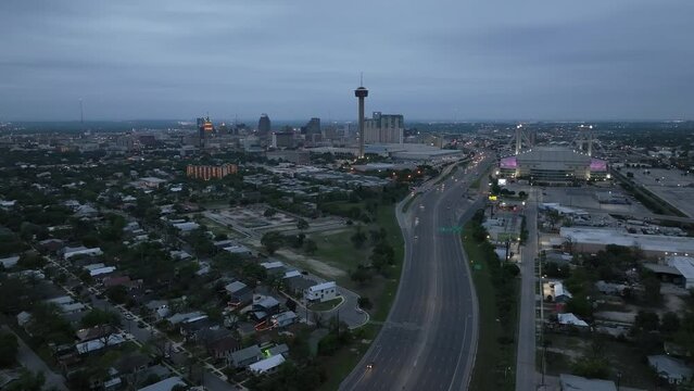 San Antonio, Texas wide shot skyline in the evening with drone video moving left to right.