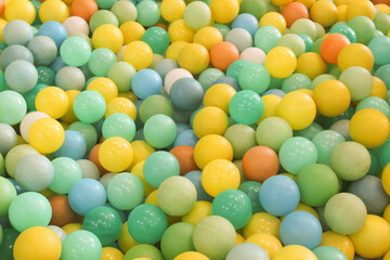 plastic toy balls on the children's playground with attractive colors