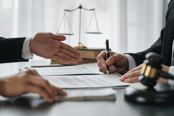 business woman offers bribes to lawyers To help with legal matters in court, bribes corruption illegal fraud bribery concept.