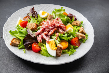 meat salad, bacon, egg, crouton, lettuce, salad dressing vinaigrette  Vosges salad Lorraine cuisine  meal food snack on the table copy space food background rustic top view
