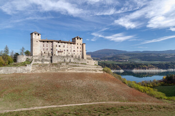 Fototapeta na wymiar Cles castle and Lake Santa Giustina, Trentino, Italy