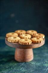 front view sweet cookies on dark background biscuit sugar cake pie sweet dessert break dough tea