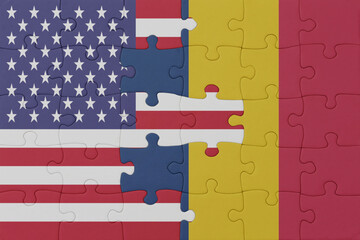 Obraz premium puzzle with the national flag of chad and united states of america.macro
