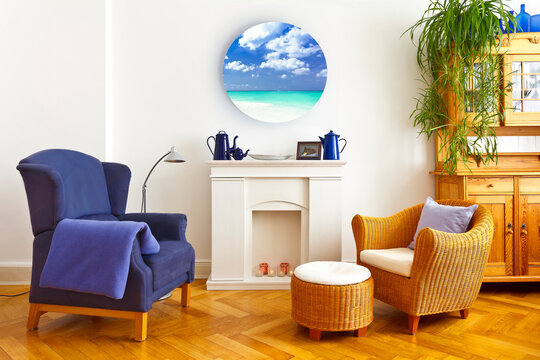 Extraordinary home decoration concept: colorful but cozy living room with a custom-made round beach photo printed on canvas, wood, hardboard or metal.