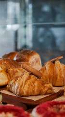 display of fresh baked bakery pastry bread, croissant and garlic bread