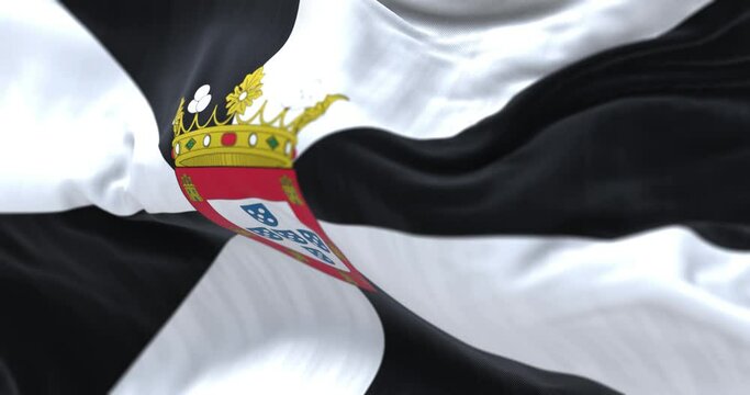 Seamless loop in slow motion of Ceuta flag waving in the wind