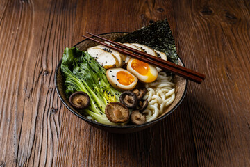 Traditional ramen with jerked pork or chicken.  With udon or ramen noodles. Served in classic...
