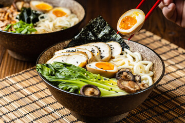 Traditional ramen with jerked pork or chicken.  With udon or ramen noodles. Served in classic...