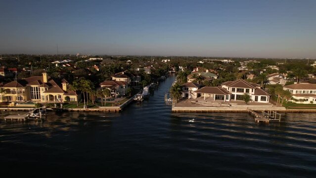 Aerial of the beautiful houses on the ocean shore at North Palm Beach, Florida on a sunny day