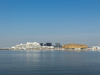 View of Yas Bay Waterfront with Etihad Arena, Formula One track and TwoFour 54 Building in Abu Dhabi