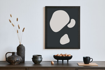 Creative composition of modern living room interior design with mock up poster frame, brown...