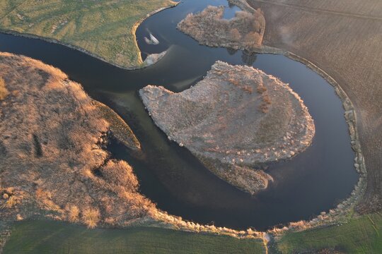Beautiful meanders of the Gwda River in Poland seen from a drone
