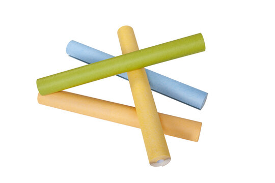 Rolls of wallpaper in different colors isolated on white background with clipping path