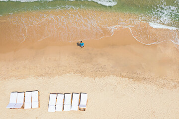 Aerial view of a man on the beach on the Caribbean coast.