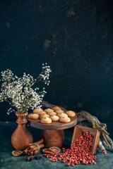 front view yummy biscuits with peanuts on dark blue background cookie biscuit cake pie sugar color sweet nut
