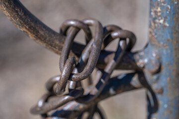 An old iron chain on the gate.