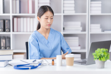 Smiling of doctor recommends taking medicine, supplement, vitamins,  Practitioner with bottle of pills. white plastic pill bottle on doctor wooden table. 