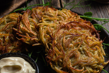 Potato pancakes with garlic sauce. Draniki