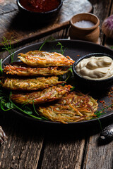 Potato pancakes with garlic sauce. Draniki