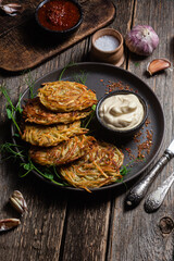 Potato pancakes with garlic sauce. Draniki
