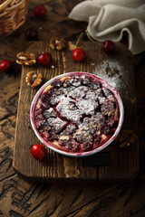 Homemade cherry crumble with walnut