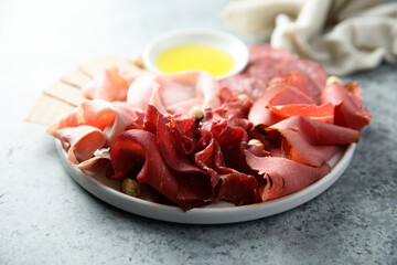 Meat platter with nuts and bread