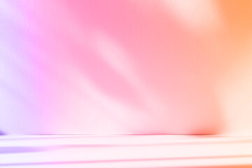 Abstract pink color gradient studio background for product presentation. Empty room with shadows of...