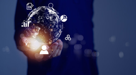 Business hand holding a virtual globe with financial icons future technology,  global internet connection technology business and digital marketing,  finance and banking, big data.