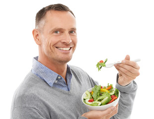Healthy food, diet and portrait of happy man with salad, nutrition and smile isolated on transparent png background. Health, happiness and hungry male model eating vegetable bowl for vegan benefits.