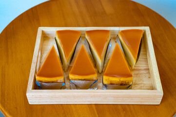 Caramel custard cake, Custard chiffon cake,Sweet and moist dessert. Sliced a piece of cake. Top...