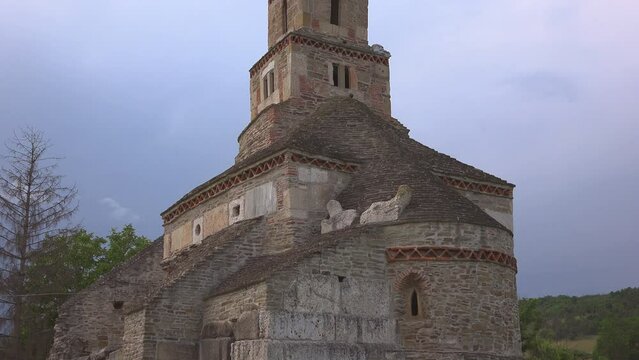 Tilt view of the ancient Densus stone church in Romania