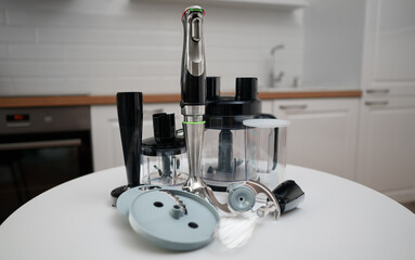 Kitchen blender with attachments and food processor.