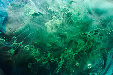 Fototapeta na wymiar Green contrast liquid art background. Paint ink explosion, abstract clouds of smoke mock-up, watercolor underwater