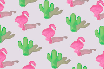 Trendy summer pattern with pink flamingos and green cactuses on white background. Minimal summer concept.