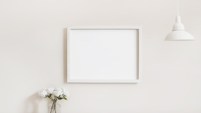 White horizontal picture frame on wall with decoration