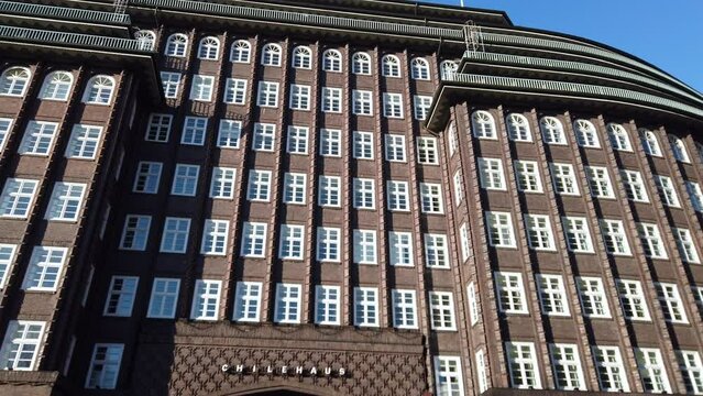 Pan along brick facade of Chilehaus in Hamburg city, 4k footage