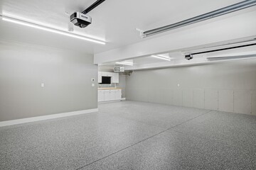 Large white room with a metallic surface floor and lighting