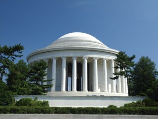 Thomas Jefferson Memorial surrounded by lush green trees in Washington, D.C.