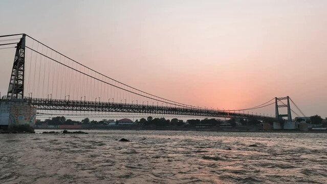 Ram jula [Ram Setu] bridge in ganga river with sunset View