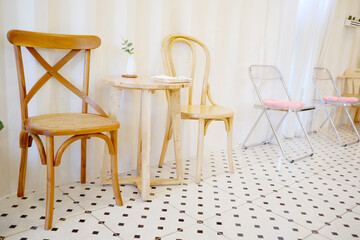 Modern wooden table and chairs set.