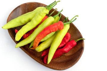 fresh green sweet peppers garden pepper, banana peppers, on a wood background